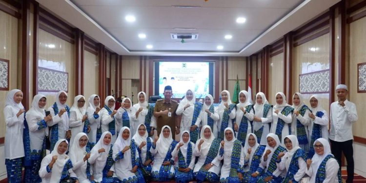 Bupati BBS Hadiri Pelantikan Pengurus BKMT Kabupaten Muaro Jambi Tahun 2025-2030